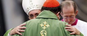 Pope Francis greets Cardinal Gerald Cyprien Lacroix of Canada during a thanksgiving mass for Canadian Saints in St.Peter's Basilica at the Vatican