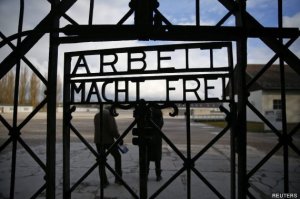 File picture shows main gate of the former Dachau concentration camp with the sign "Arbeit macht frei" in Dachau