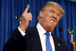 Republican presidential candidate Donald Trump gestures and declares "You're fired!" at a rally in Manchester, New Hampshire, June 17, 2015. REUTERS/Dominick Reuter TPX IMAGES OF THE DAY