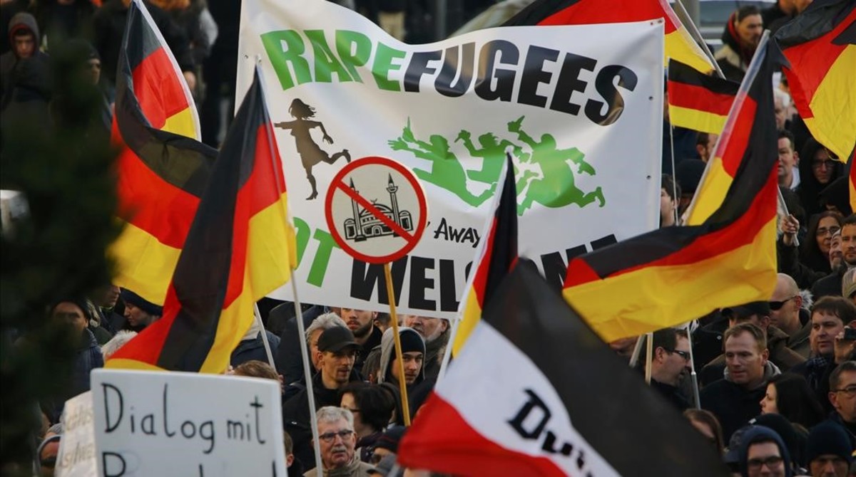 Supporters of anti-immigration right-wing movement PEGIDA  Patriotic Europeans Against the Islamisation of the West  take part in in demonstration march  in reaction to mass assaults on women on New Year s Eve  in Cologne  Germany  January 9  2016    REUTERS Wolfgang Rattay