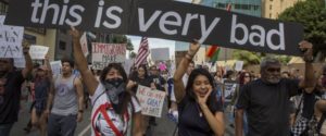 LOS ANGELES, CA - NOVEMBER 12: Protesters march in reaction to the upset election of Republican Donald Trump over Democrat Hillary Clinton in the race for President of the United States on November 12, 2016 in Los Angeles, California, United States. Hundreds of Angelenos have been arrested in recent days and some have vandalized property but the vast majority of the thousands of protesters have remain peaceful.   David McNew/Getty Images/AFP == FOR NEWSPAPERS, INTERNET, TELCOS & TELEVISION USE ONLY ==